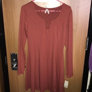 This is a NEW dress. The tags are still on!